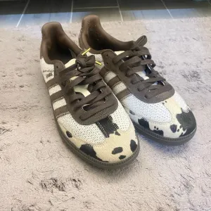 Adidas cow print sambas