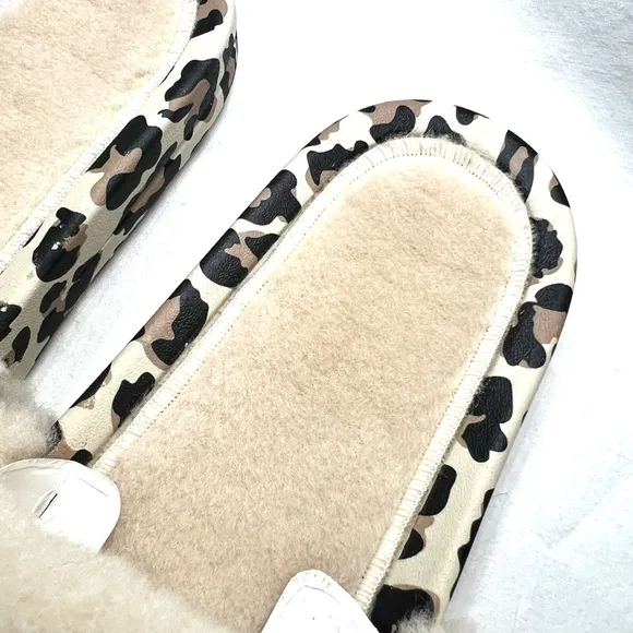 APL Athletic Propulsion Labs Cream and Black Fur Slides with Animal Print