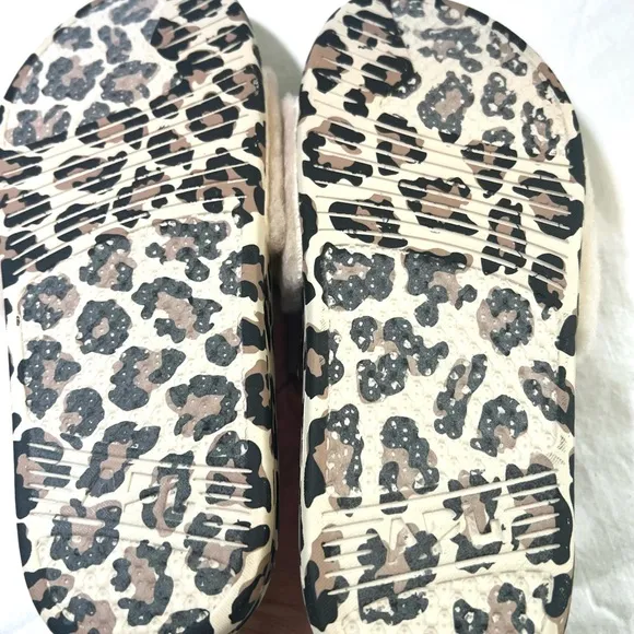 APL Athletic Propulsion Labs Cream and Black Fur Slides with Animal Print