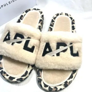 APL Athletic Propulsion Labs Cream and Black Fur Slides with Animal Print