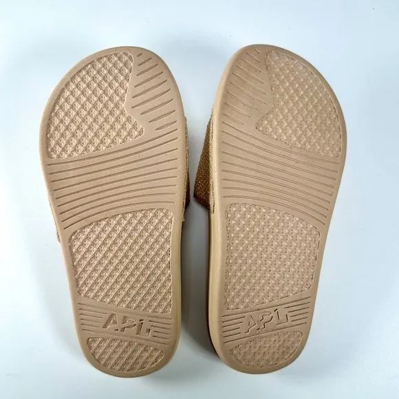 APL: Athletic Propulsion Labs Women’s Big Logo Techloom Slides in Parchment