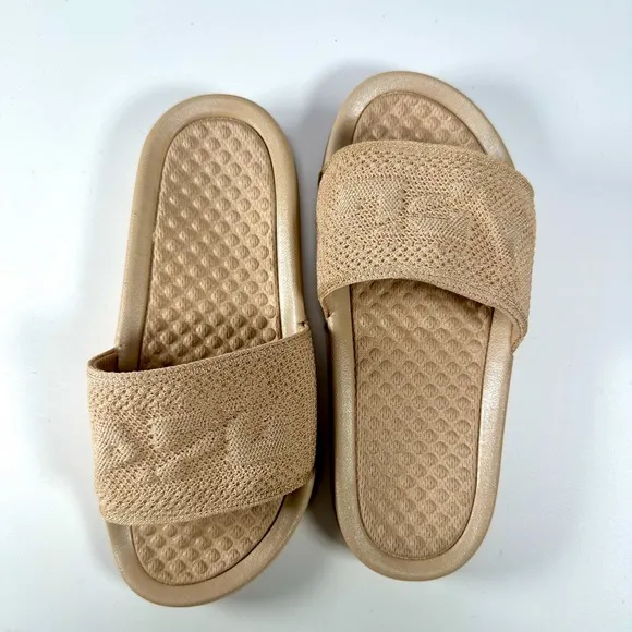 APL: Athletic Propulsion Labs Women’s Big Logo Techloom Slides in Parchment