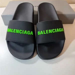 Balenciaga Black Slides with Green Logo
