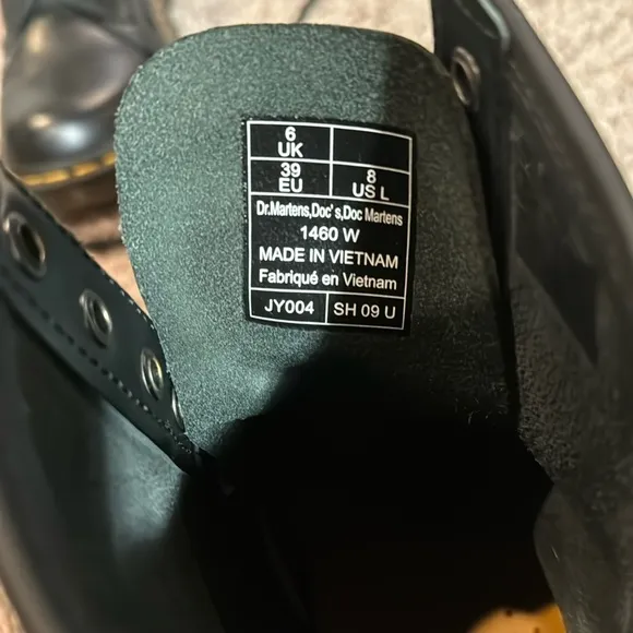 Black leather high top DRMARTENS boots