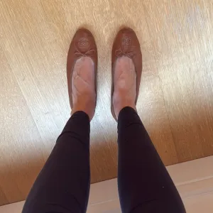 CHANEL Brown Leather Flats with Bow Detail