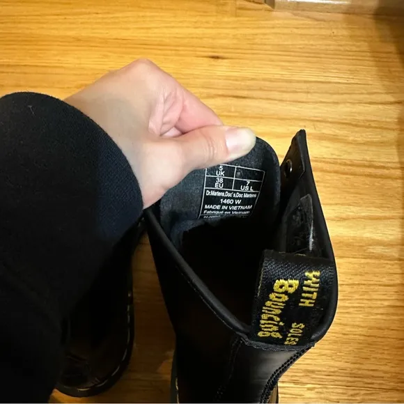 Doc Martens 1460 Womens Black Lace-Up Boots with yellow welt stitching