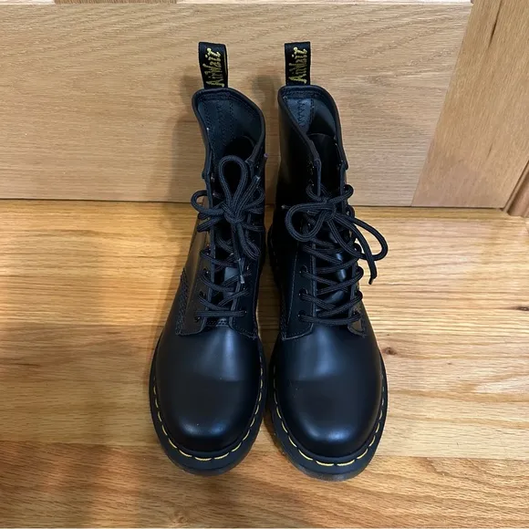 Doc Martens 1460 Womens Black Lace-Up Boots with yellow welt stitching