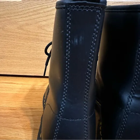 Doc Martens 1460 Womens Black Lace-Up Boots with yellow welt stitching