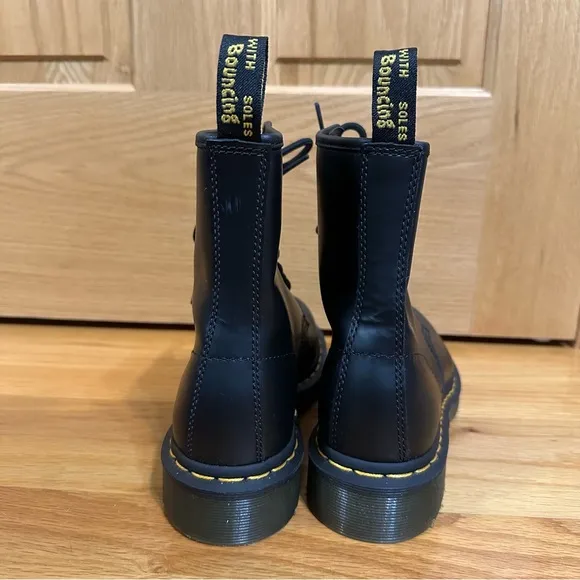 Doc Martens 1460 Womens Black Lace-Up Boots with yellow welt stitching