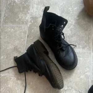 Dr. Martens matte Black Leather lace up Boots