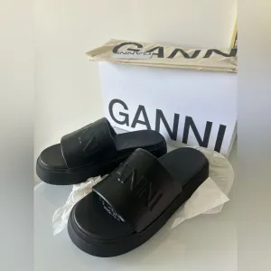 GANNI Black Embossed Logo Platform Sandals