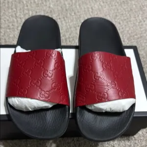Gucci Red Embossed Slides