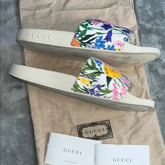 Gucci Women's Floral Pink Slides.                               order(67)