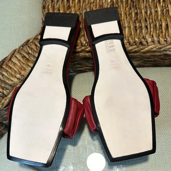 KHAITE Red Leather Slide sandals.