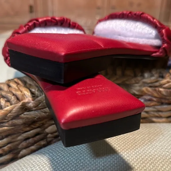 KHAITE Red Leather Slide sandals.
