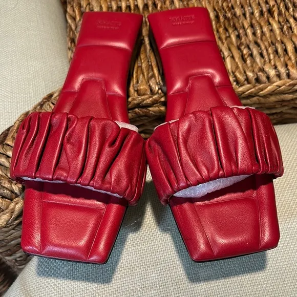 KHAITE Red Leather Slide sandals.