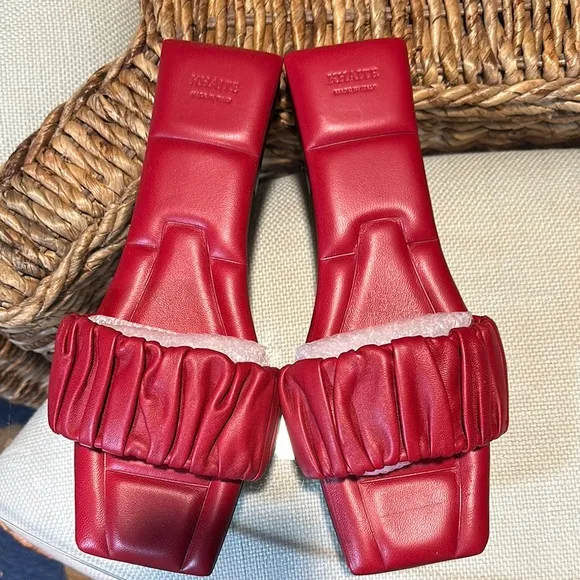 KHAITE Red Leather Slide sandals.
