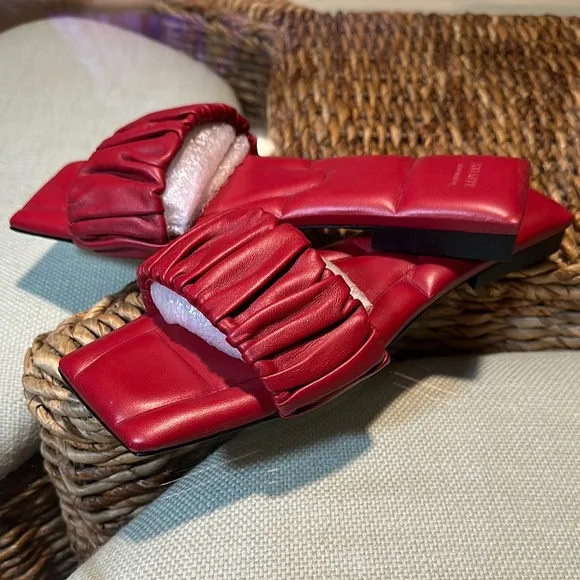 KHAITE Red Leather Slide sandals.