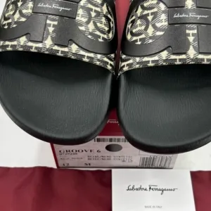 Men’s Salvatore Ferragamo groove pool slides Black and Beige Slides. Size 12