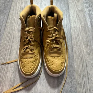 Nike Men's High-Top Sneakers in Mustard Yellow outdoor