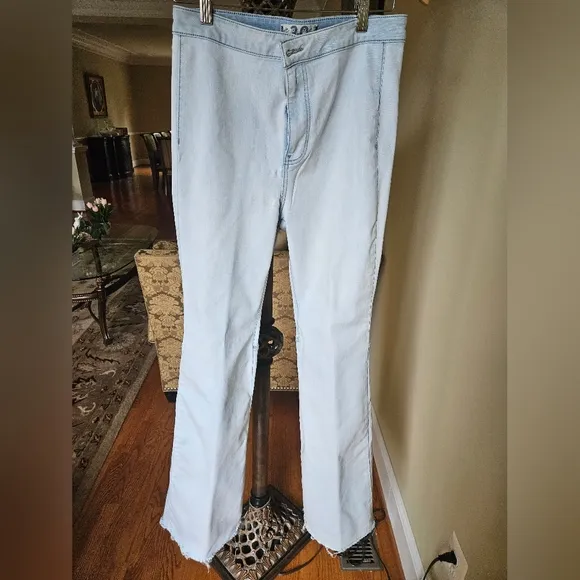 NWOT We The Free light wash boot cut jeans