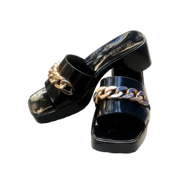 NWT/B Mata Shoe Slides Slay black jelly heels with chunky gold chain detail