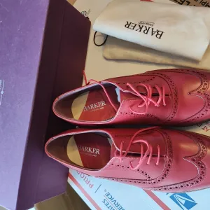 Red Leather Flats with Broguing Details
