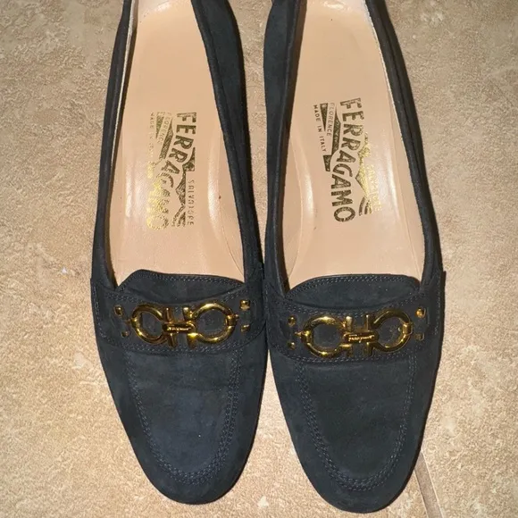 Salvatore Ferragamo Black and Gold Flats