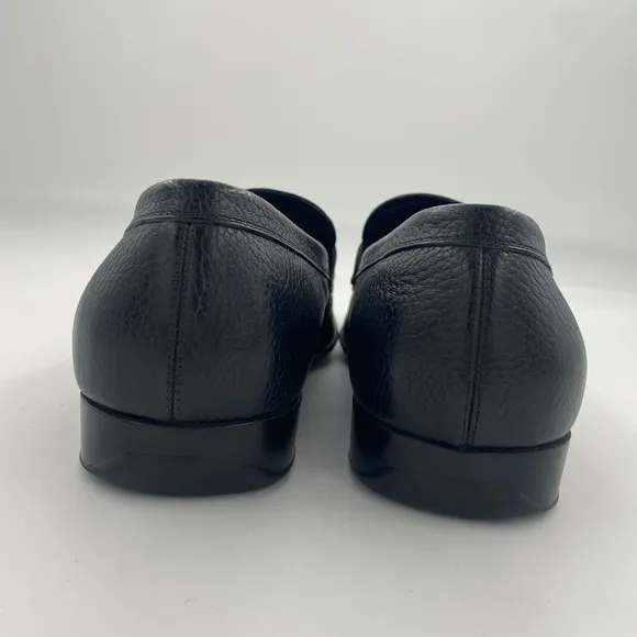 Salvatore Ferragamo black loafers with silver logo