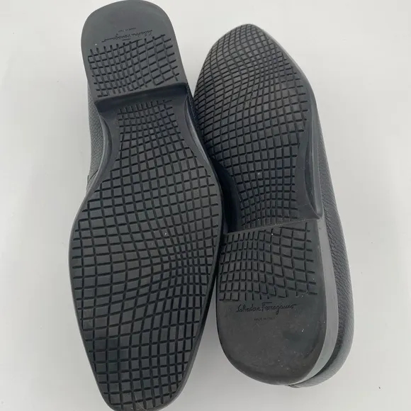 Salvatore Ferragamo black loafers with silver logo