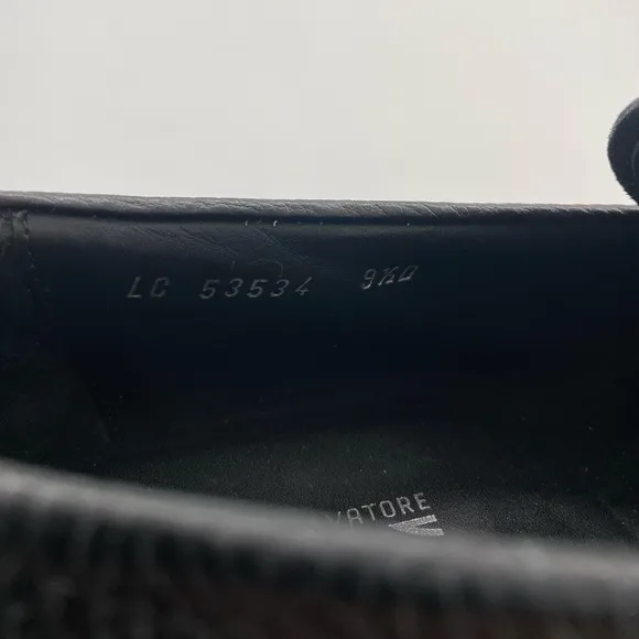 Salvatore Ferragamo black loafers with silver logo