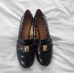 Tory Burch Elegant Black Loafers with Gold Accent