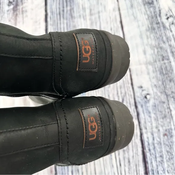 UGG ELSA QUILTED LEATHER AND SHEEPSKIN LACE UP TALL BOOTS IN BLACK