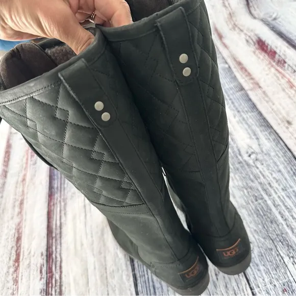 UGG ELSA QUILTED LEATHER AND SHEEPSKIN LACE UP TALL BOOTS IN BLACK