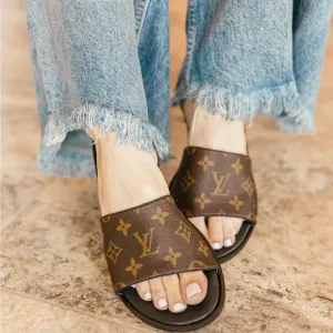Vintage Boho Louis Vuitton slide sandals. Classic brown logo.Women’s size 7-8
