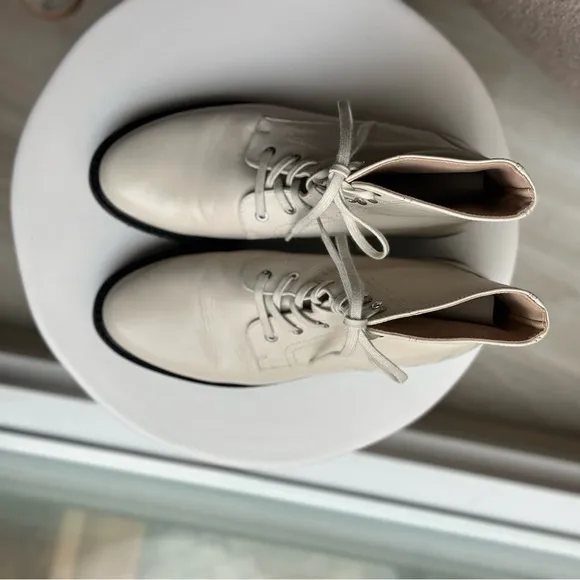 White/cream leather Stuart Weitzman lace up boots