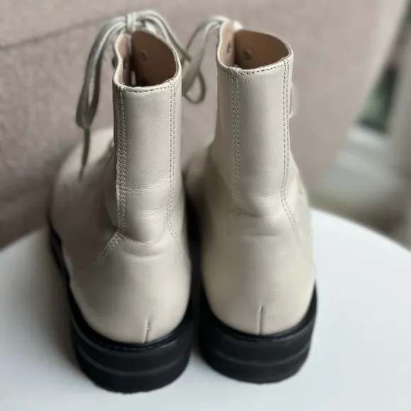 White/cream leather Stuart Weitzman lace up boots