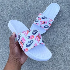 WMNS NIKE BENASSI SLIDES JUSTDO IT WHITES PRINTS PINKS GREYS ORANGES WHITES