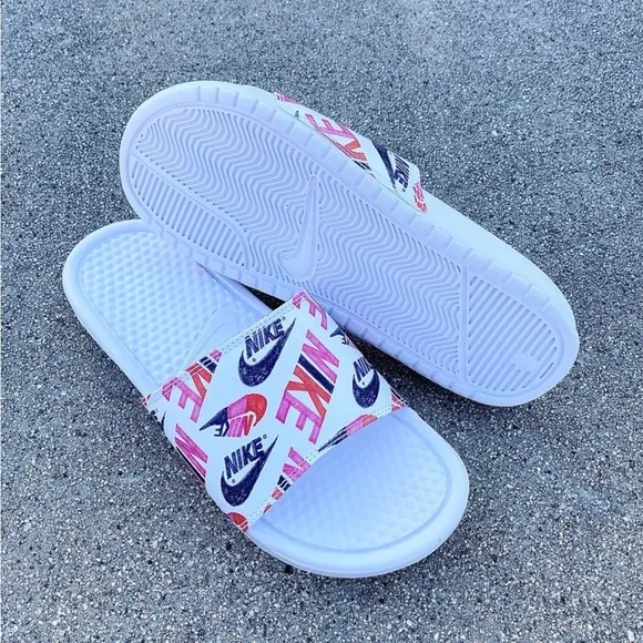 WMNS NIKE BENASSI SLIDES JUSTDO IT WHITES PRINTS PINKS GREYS ORANGES WHITES